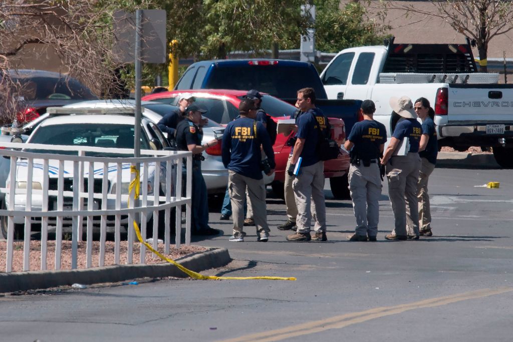 FBI agents check vehicles outside the Cielo Vista Mall Wal-Mart where a shooting left 20 people dead in El Paso, Texas, on August 4, 2019. (Mark Ralston—AFP/Getty Images)