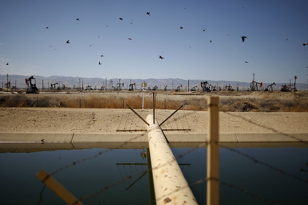 A high pressure gas line crossing a canal in an oil field over the Monterey Shale formation on March 23, 2014 near Lost Hills, California. (David McNew—Getty Images)