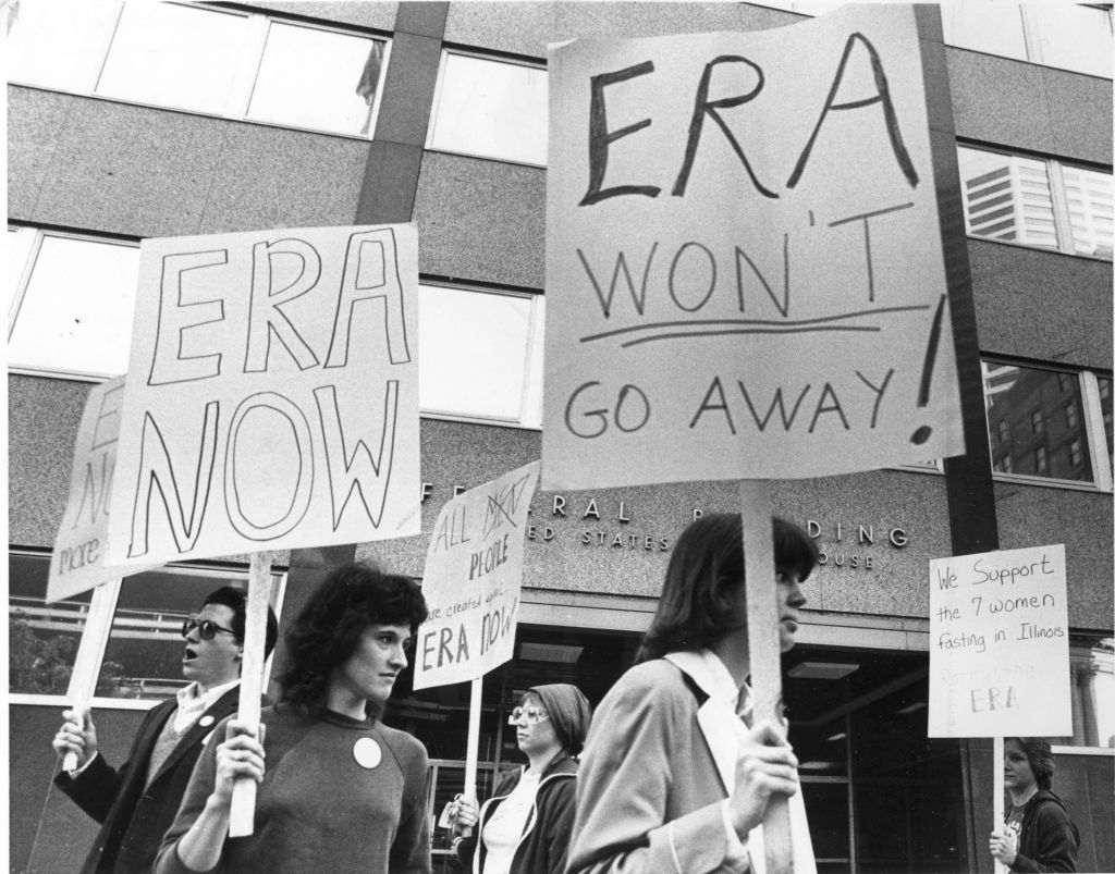 Demonstrators picketed outside the Federal Building in Minneapolis, Wednesday June 9, 1982, in support of the Equal Rights Amendment and in silent vigil in support of seven fasting ERA-supporters in Illinois. Photo ran in a late edition of the same day's