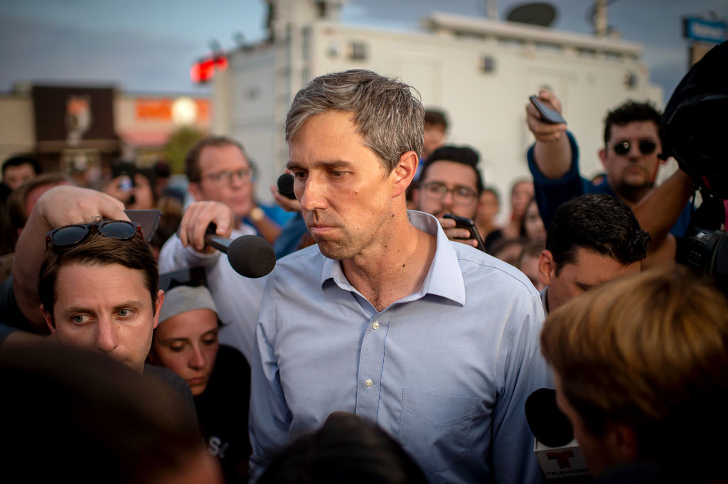Beto O'Rourke, former Representative from Texas and 2020 Democratic presidential candidate, center, pauses as he speaks to members of the media outside Cielo Vista Walmart in El Paso, Texas, U.S., on Wednesday, Aug. 7, 2019. Donald Trump sought to console the grief-stricken residents of El Paso and Dayton on Wednesday, a trip that has so far been conducted largely out of public view following Democratic criticism of the presidents rhetoric on race and immigration and his positions on gun safety. Photographer: Luke E. Montavon/Bloomberg via Getty Images (Luke E. Montavon—Bloomberg/Getty Images)