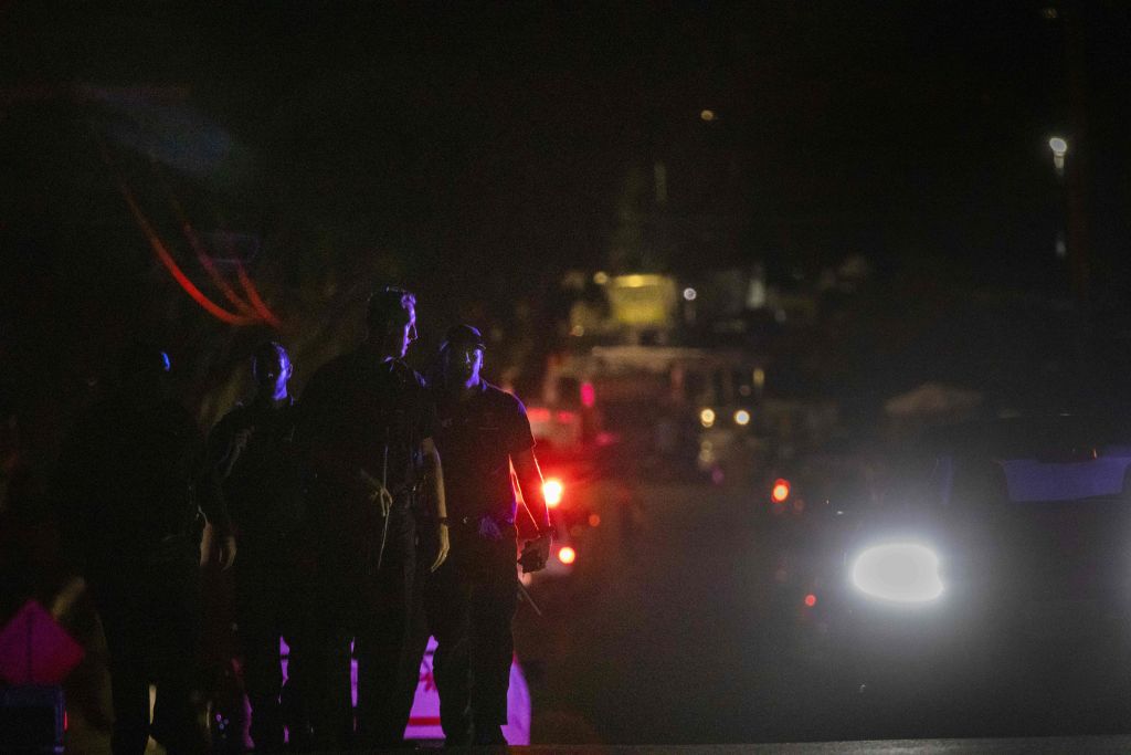 Police officers leave the scene of the investigation following a deadly shooting at the Gilroy Garlic Festival in Gilroy, California on July 28, 2019. (Philip Pacheco—AFP/Getty Images)