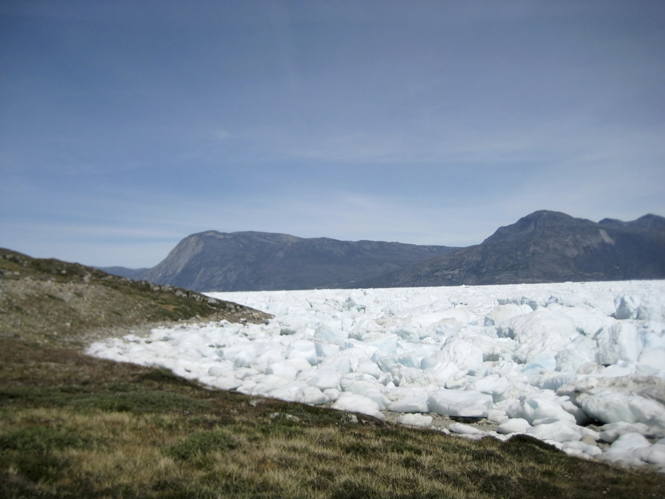 An image taken on June 18, 2019 of the Kangersuneq glacial ice fields in Kapissisillit, Greenland. Milder weather than normal since the start of summer, led to the UN's weather agency voicing concern that the hot air which produced the recent extreme heat wave in Europe could be headed toward Greenland where it could contribute to increased melting of ice. (Keith Virgo—AP)