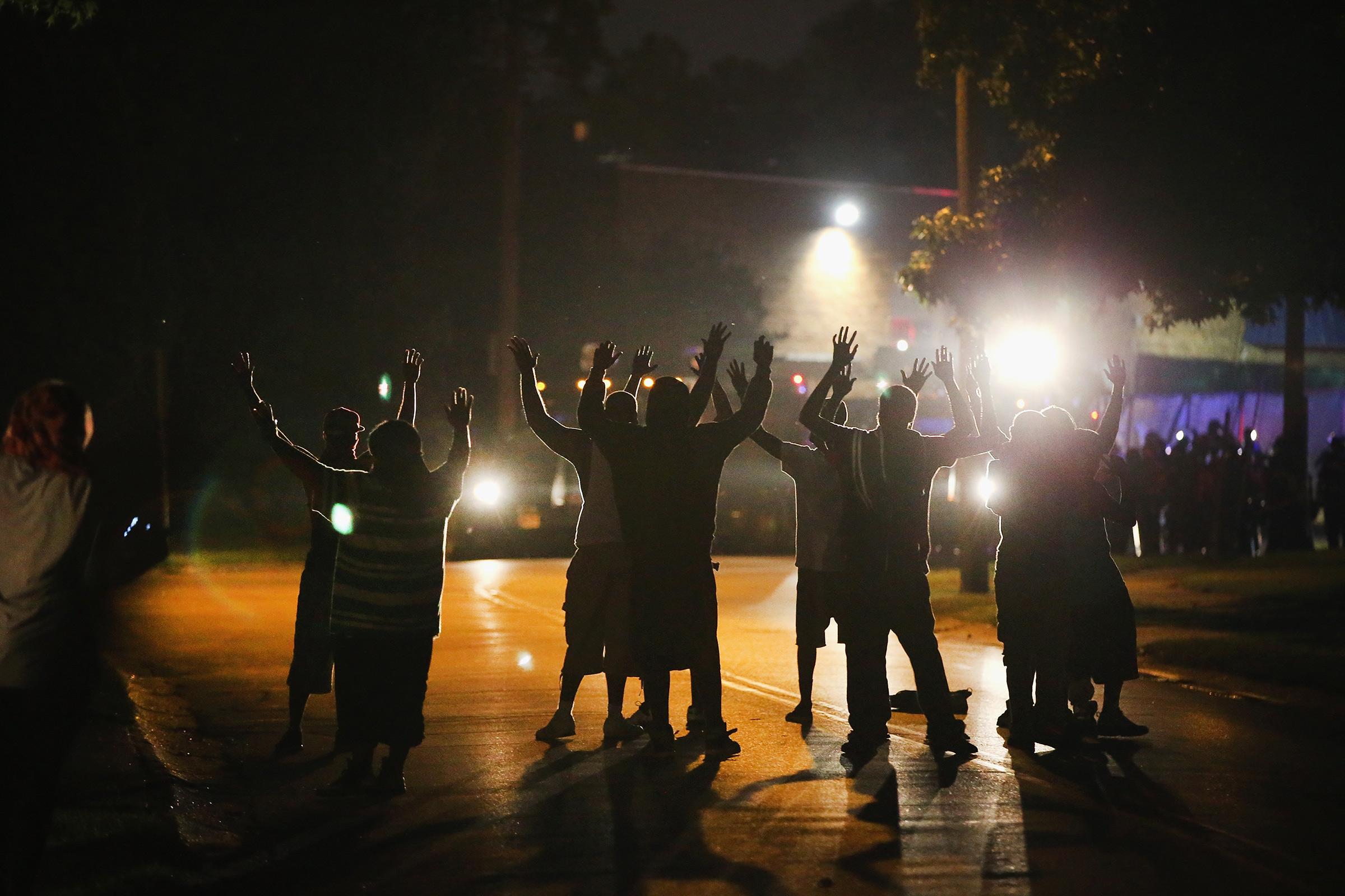 Police lock down a neighborhood in Ferguson amid protests in August 2014. (Scott Olson—Getty Images)