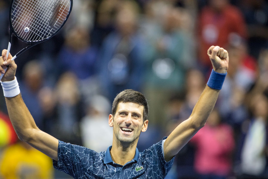 Novak Djokovic of Serbia celebrates his victory against Juan Martin Del Potro of Argentina in the Men's Singles Final on Arthur Ashe Stadium at the 2018 U.S. Open Tennis Tournament at the USTA Billie Jean King National Tennis Center on September 9, 2018 in Flushing, Queens, New York City. (Tim Clayton—Corbis/Getty Images)