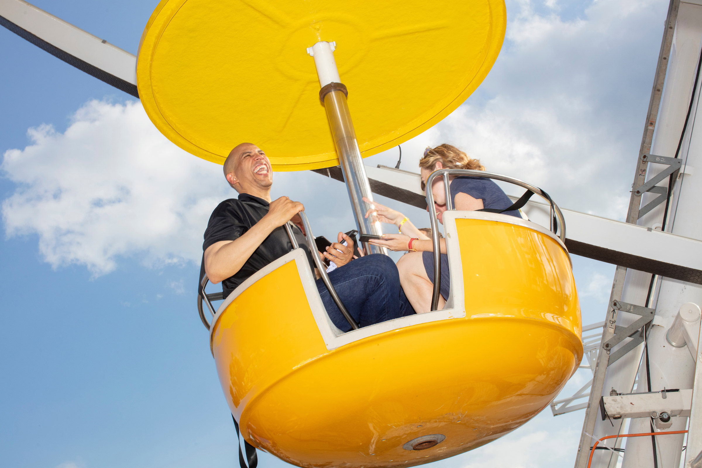 Democratic presidential candidate Cory Booker rides the ferris wheel on Aug. 10. (M. Scott Brauer for TIME)