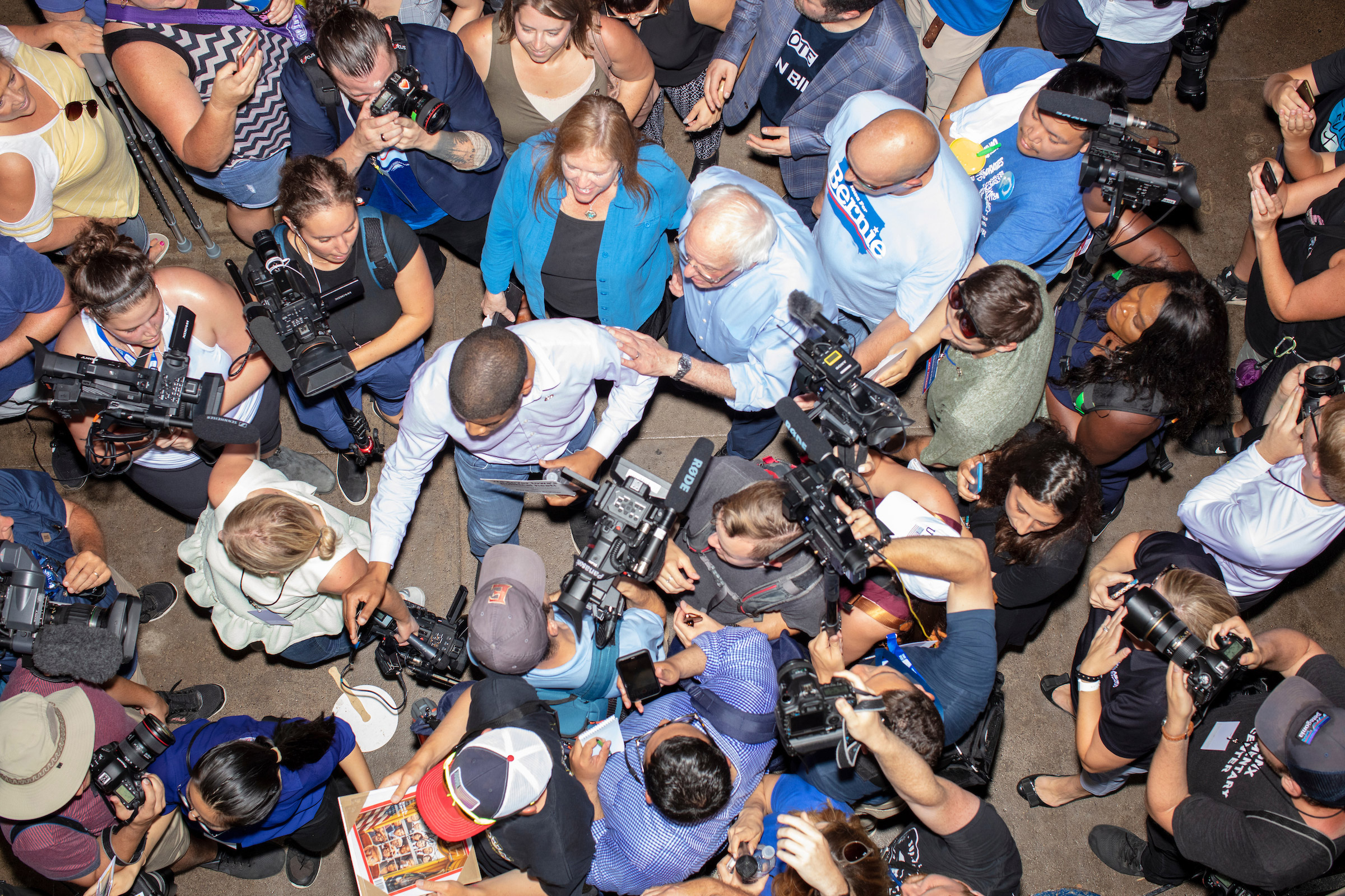 Democratic presidential candidate Bernie Sanders visits the sculpted Butter Cow in the Agriculture Building while surrounded by media and crowds on Aug. 11. (M. Scott Brauer for TIME)
