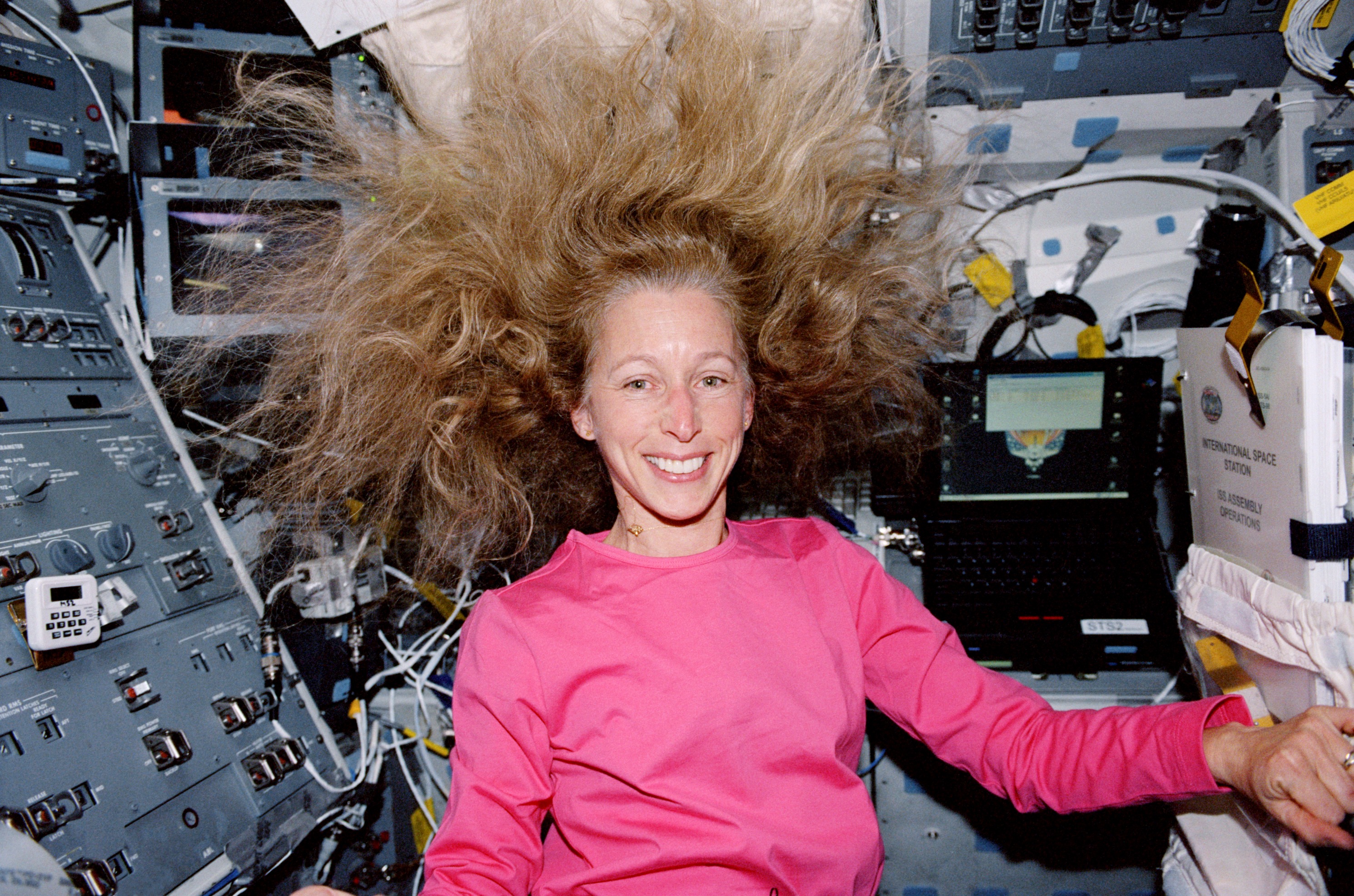 (7-20 February 2001) --- Astronaut Marsha S. Ivins, STS-98 mission specialist, is photographed on the mid deck of the Earth-orbiting Space Shuttle Atlantis. (NASA)
