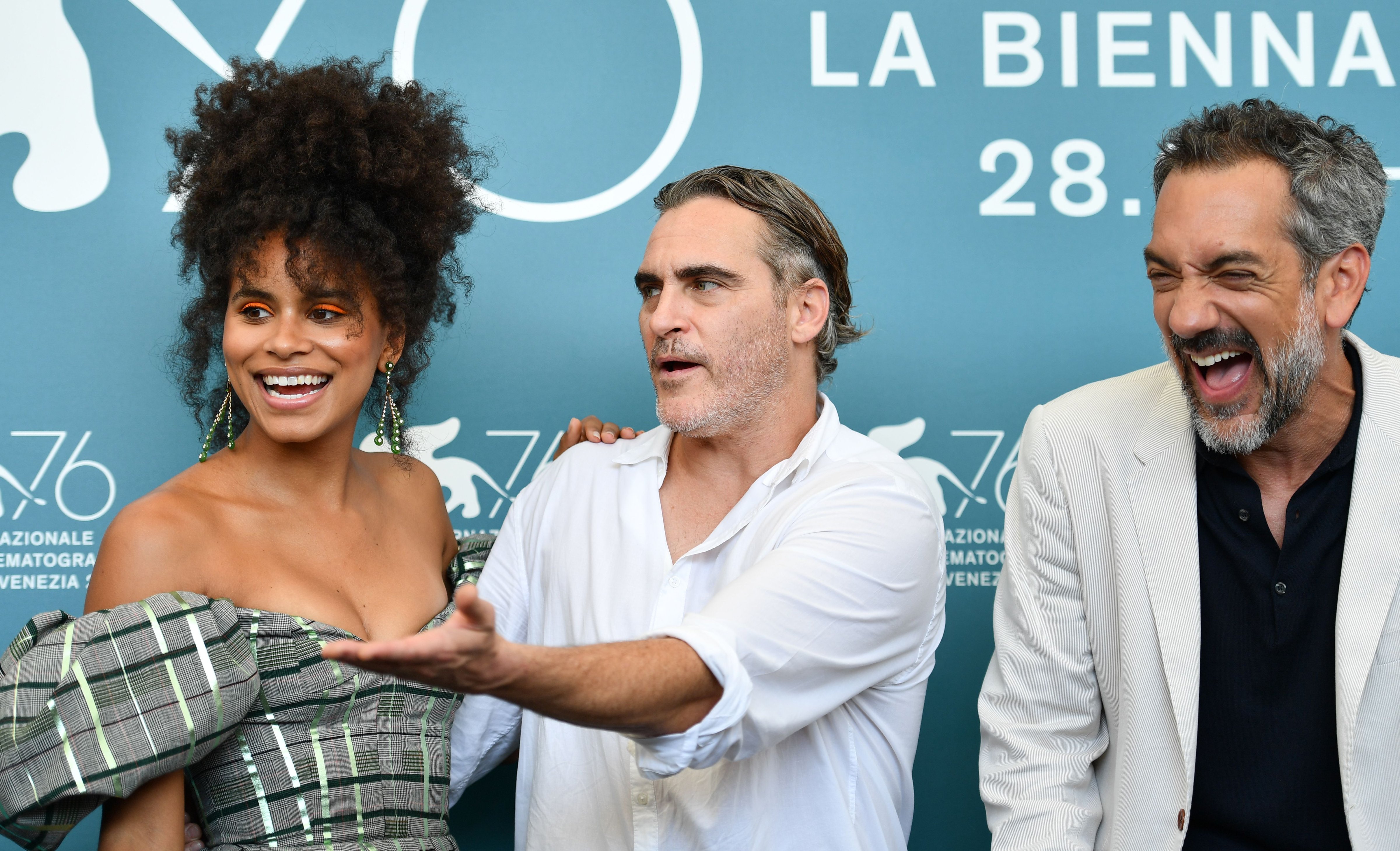 Zazie Beetz, Joaquin Phoenix and director Todd Phillips attend a photocall for the film "Joker" on August 31, 2019 during the 76th Venice Film Festival. (ALBERTO PIZZOLI—AFP/Getty Images)