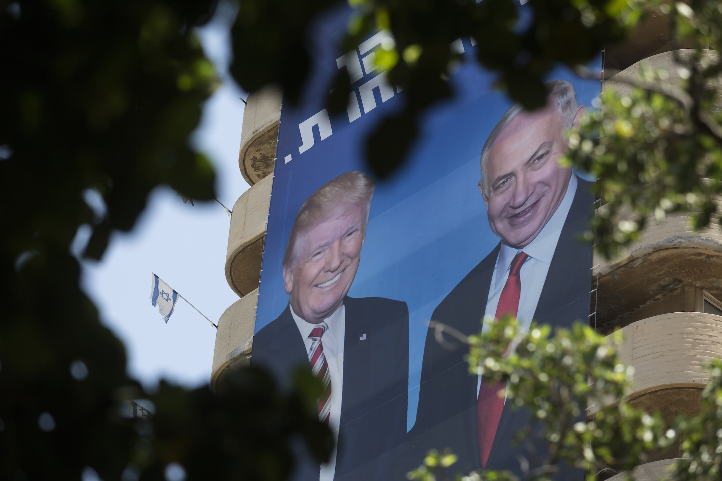 A Likud Party billboard shows Israeli Prime Minister Benjamin Netanyahu with U.S. President Donald Trump on Aug. 5, 2019 in Tel Aviv, shortly before elections there. (Amir Levy—Getty Images)