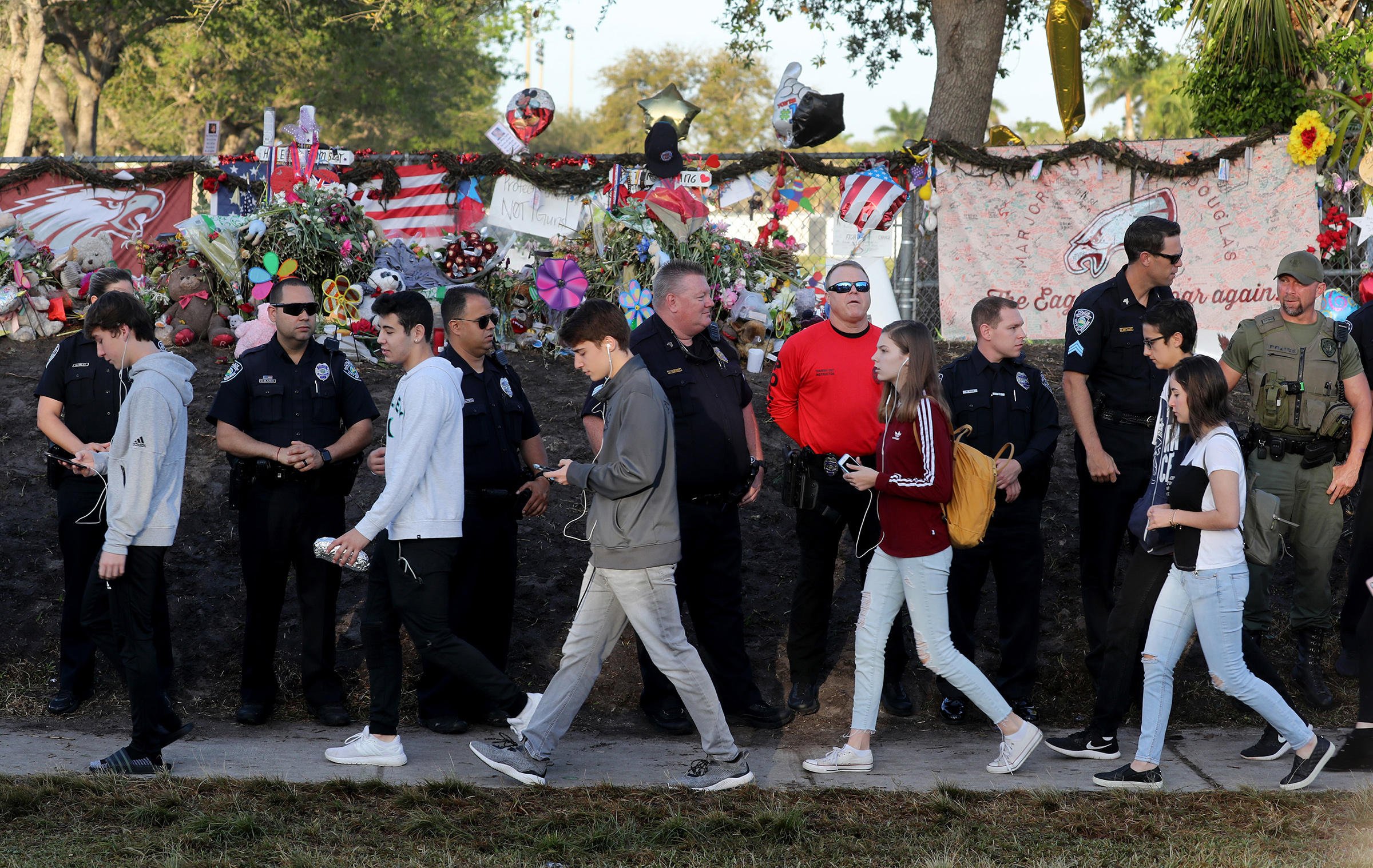 Students head back to school at Marjory Stoneman Douglas High School on Wednesday, Feb. 28, 2018 for the first time after a gunman killed 17 students in the school on Valentine's Day. (Mike Stocker—Sun Sentinel/TNS/Sipa USA)