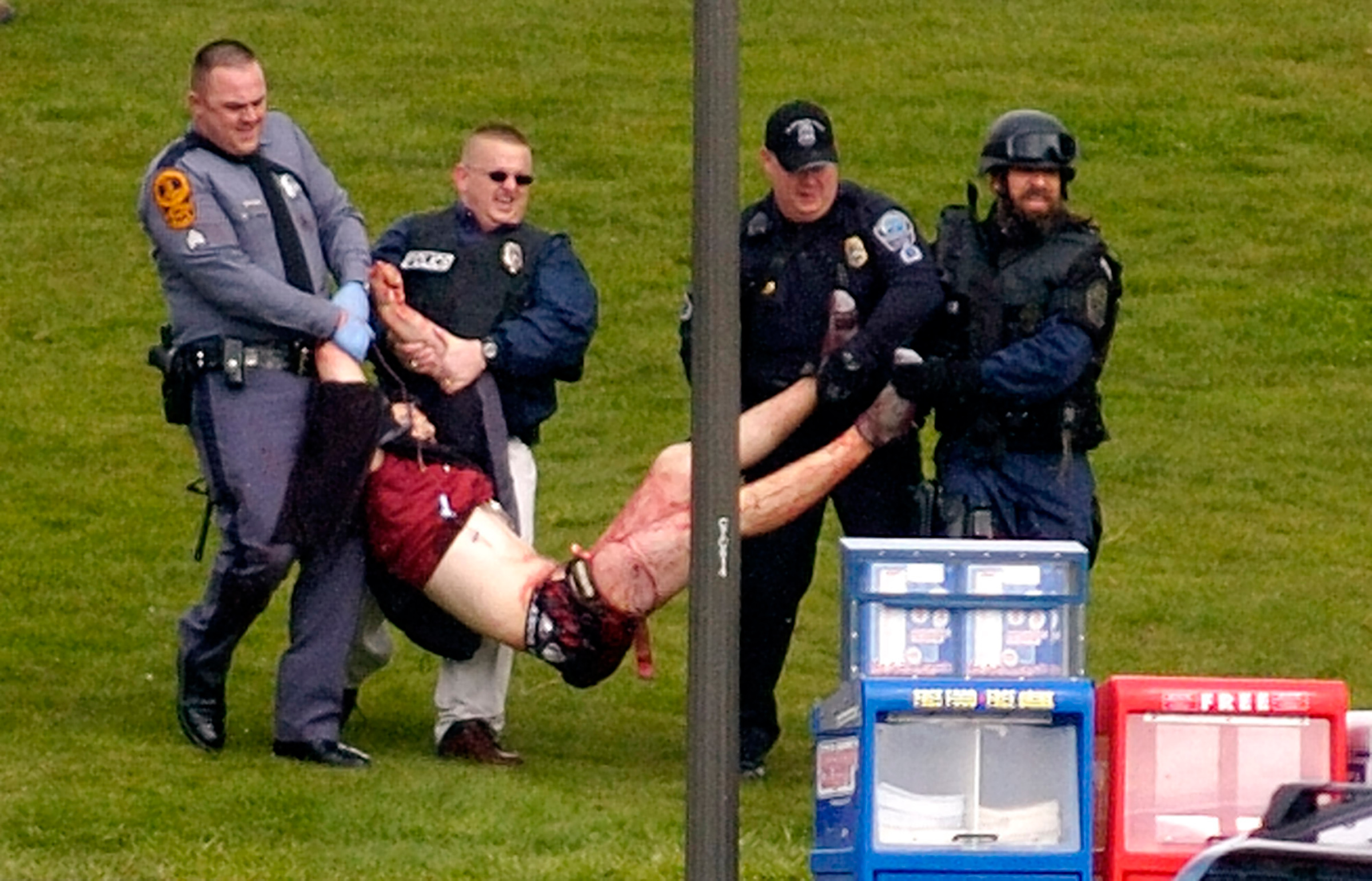 Student Kevin Sterne, is carried out of Norris Hall at Virginia Tech in Blacksburg, Va. in this April 16, 2007 photo. Sterne was one of the wounded students who survived the mass shooting on April 16. (Alan Kim—The Roanoke Times/AP)