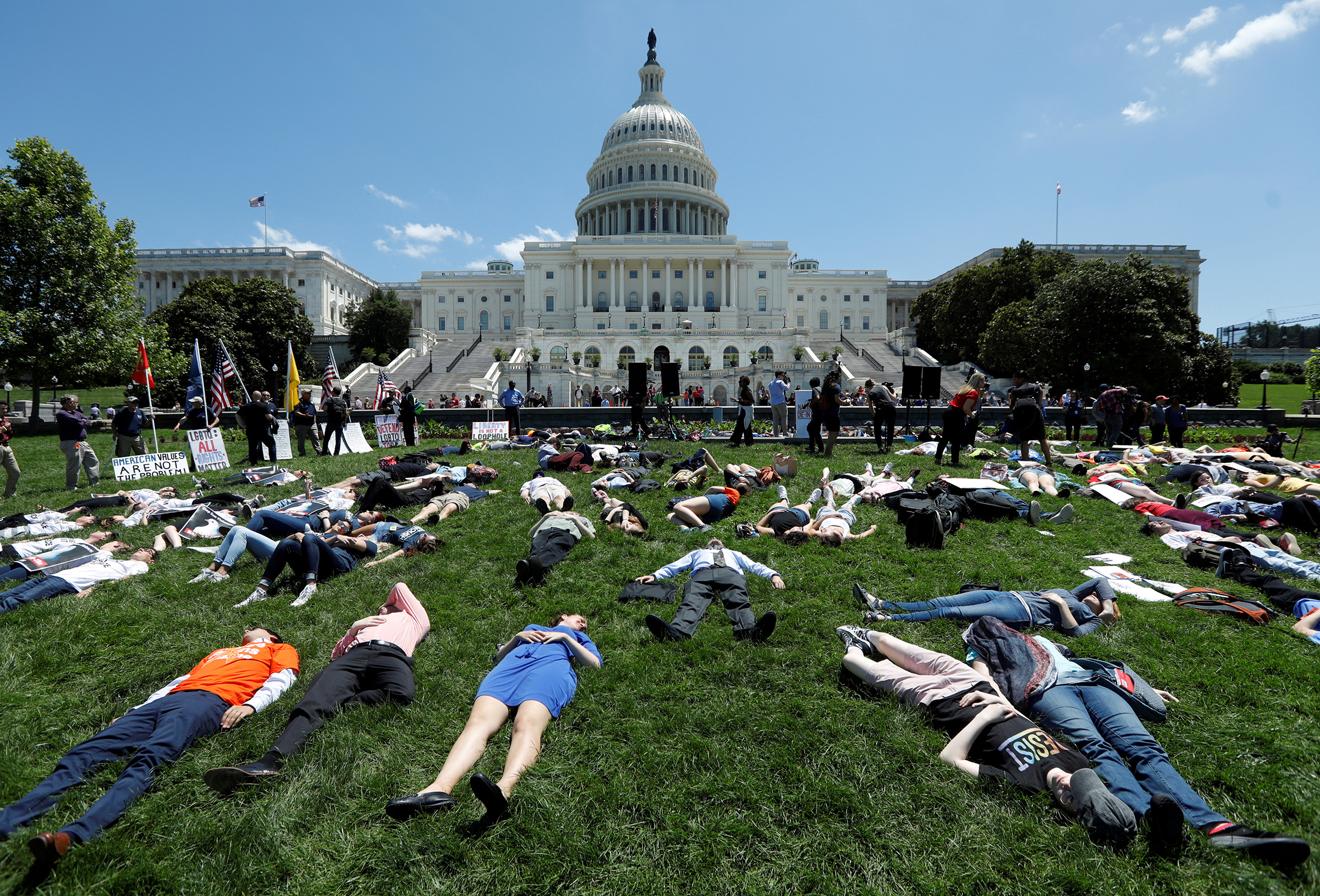 Activists mark the second anniversary of the Pulse Nightclub shooting where a gunman killed 49 people in Orlando with a die-in at the U.S. Capitol in Washington, U.S., June 12, 2018. (Kevin Lamarque—Reuters)