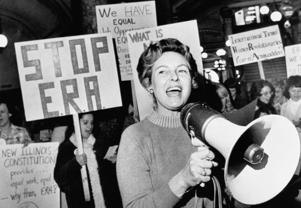 Stop ERA national Chairman Phyllis Schafly leads members opposed to the equal rights amendment in a song about the pro ERA forces plan for a national demonstration in the capital city. (Bettmann—Bettmann Archive)