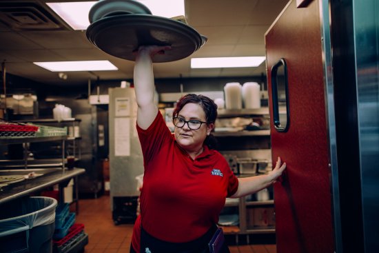 Christina Munce waits tables at Broad Street Diner in Philadelphia, where she’s worked for more than eight years.