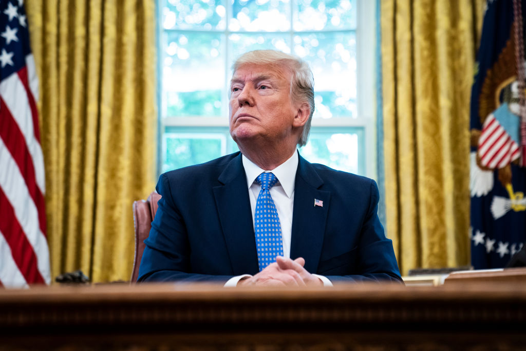President Donald Trump listens during a meeting on fentanyl and the opioid epidemic in the Oval Office at the White House in Washington, on June 25, 2019. (Jabin Botsford—The Washington Post/Getty Images)