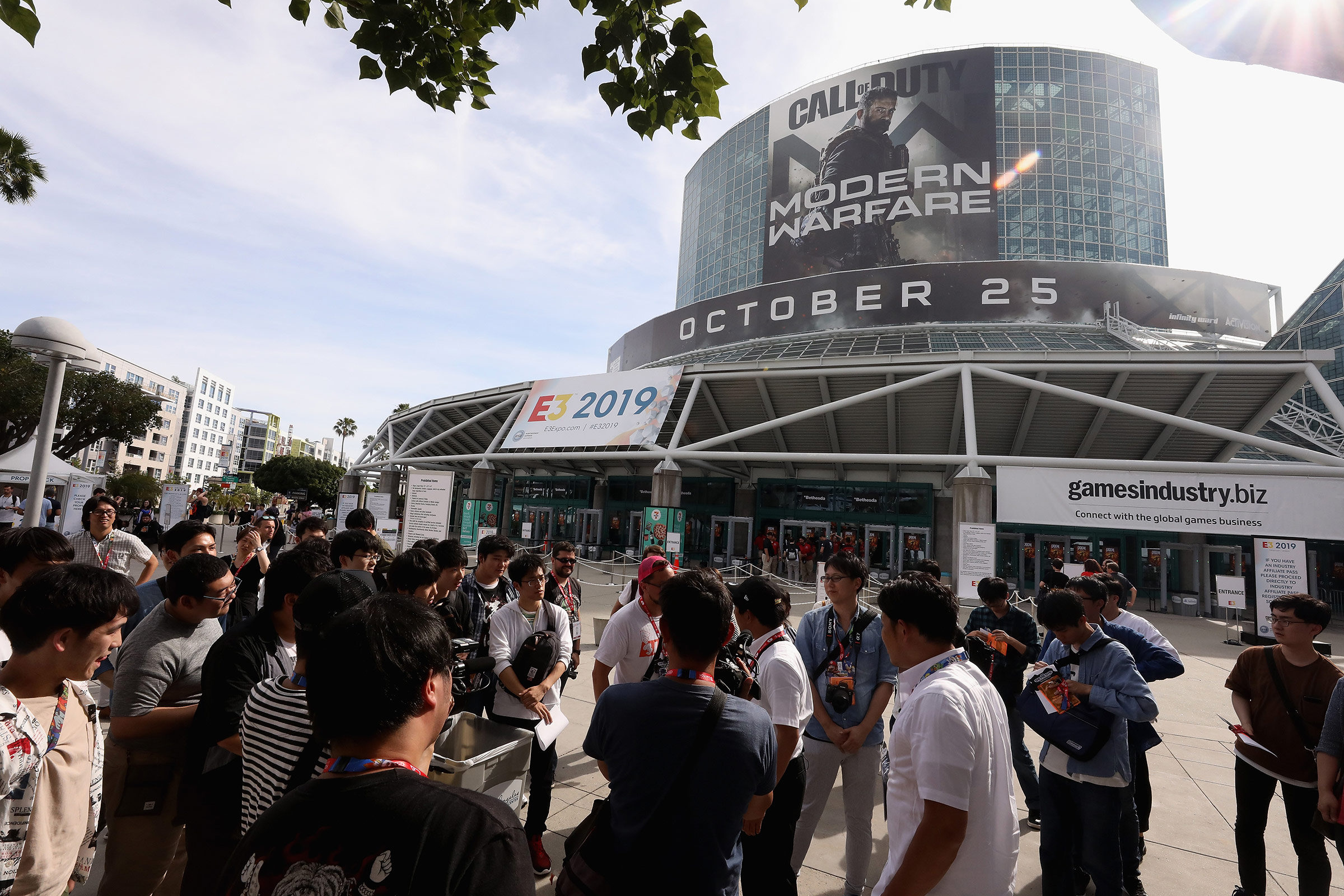 Game enthusiasts and industry personnel arrive to the Los Angeles Convention Center ahead of the E3 Video Game Convention on June 10 in Los Angeles, California. (Christian Petersen—Getty Images)