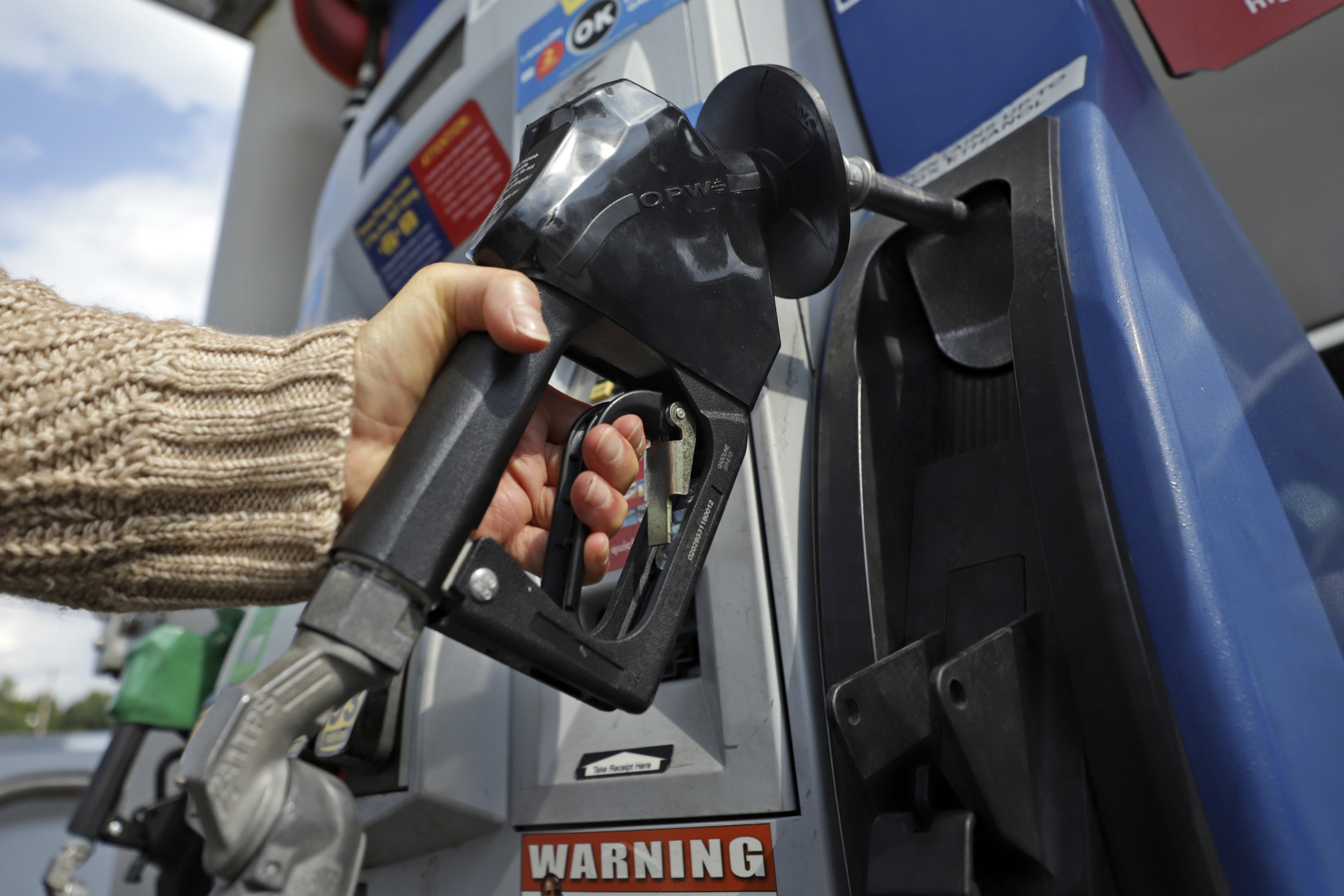 A woman pumps gas at a gas pump at a convenience store in Pittsburgh Monday, Sept. 16, 2019. Gas prices in the U.S. are already increasing. (Gene J. Puskar/AP)