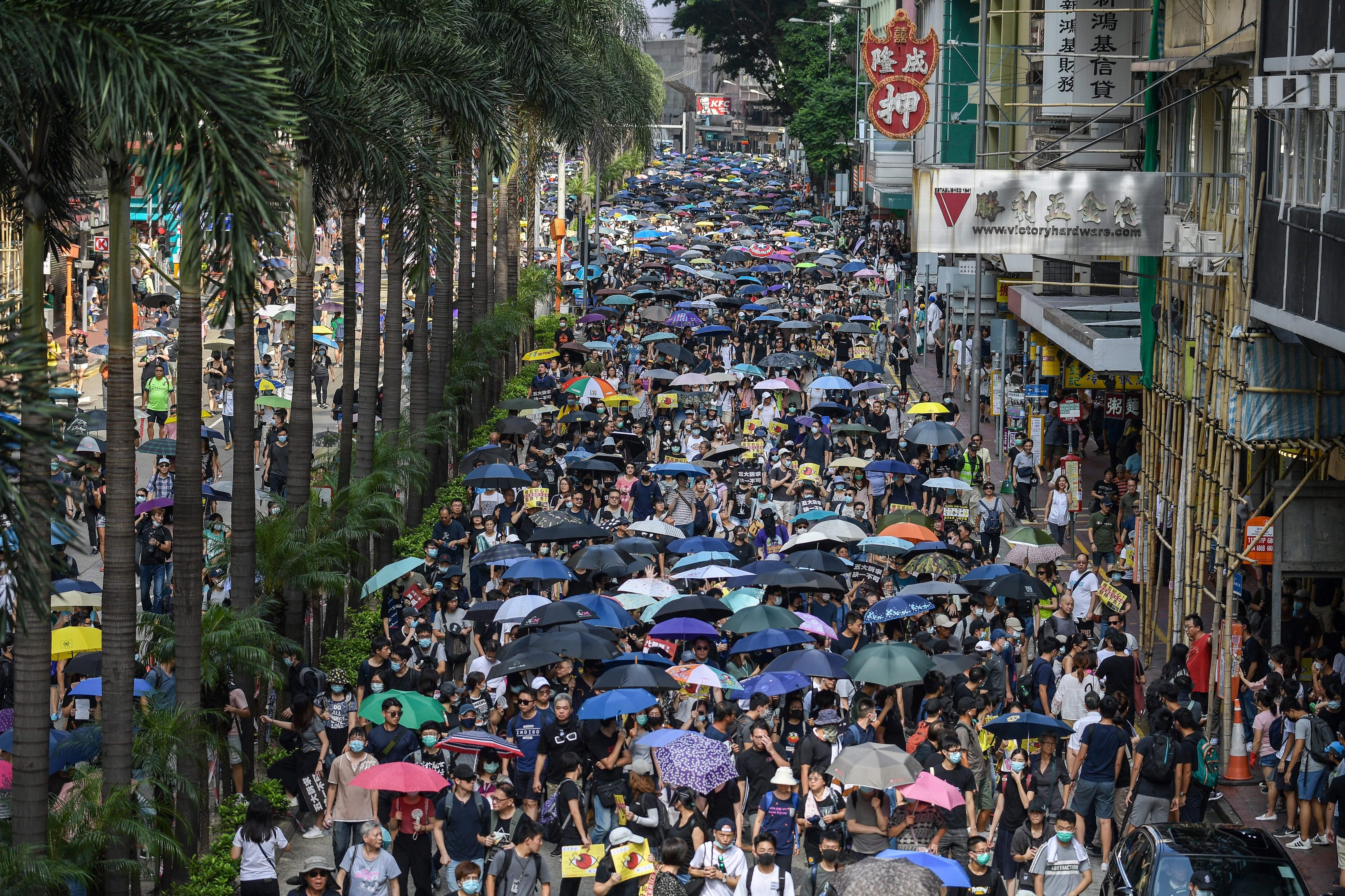 Protesters attend a pro-democracy march in Hong Kong on September 15, 2019. (NICOLAS ASFOURI—AFP/Getty Images)