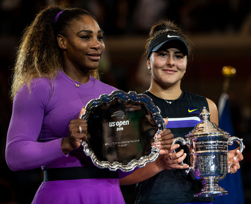 Bianca Andreescu of Canada poses with the trophy after and with runner-up Serena Williams of the United States at Arthur Ashe Stadium at the USTA Billie Jean King National Tennis Center on September 07, 2019 in New York City. (TPN&mdash;Getty Images)