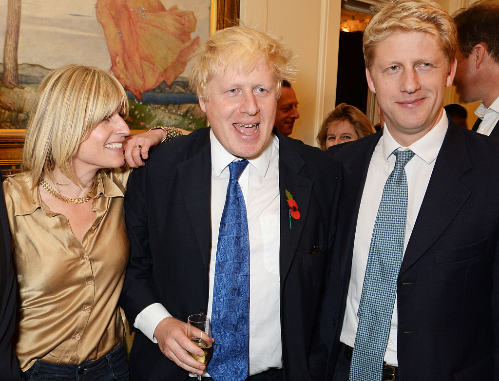 (L to R) Rachel Johnson, Boris Johnson and Jo Johnson attend the launch of Boris Johnson's new book "The Churchill Factor: How One Man Made History" at Dartmouth House on October 22, 2014 in London, England. (David M. Benett&mdash;Getty Images)