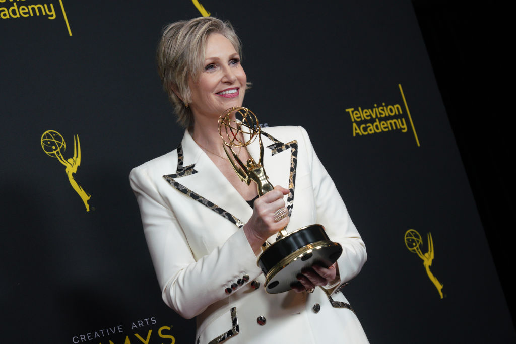 Jane Lynch poses in the press room with the award for outstanding guest actress in a comedy series for "The Marvelous Mrs. Maisel" during the 2019 Creative Arts Emmy Awards on September 15, 2019 in Los Angeles, California. (JC Olivera—WireImage)
