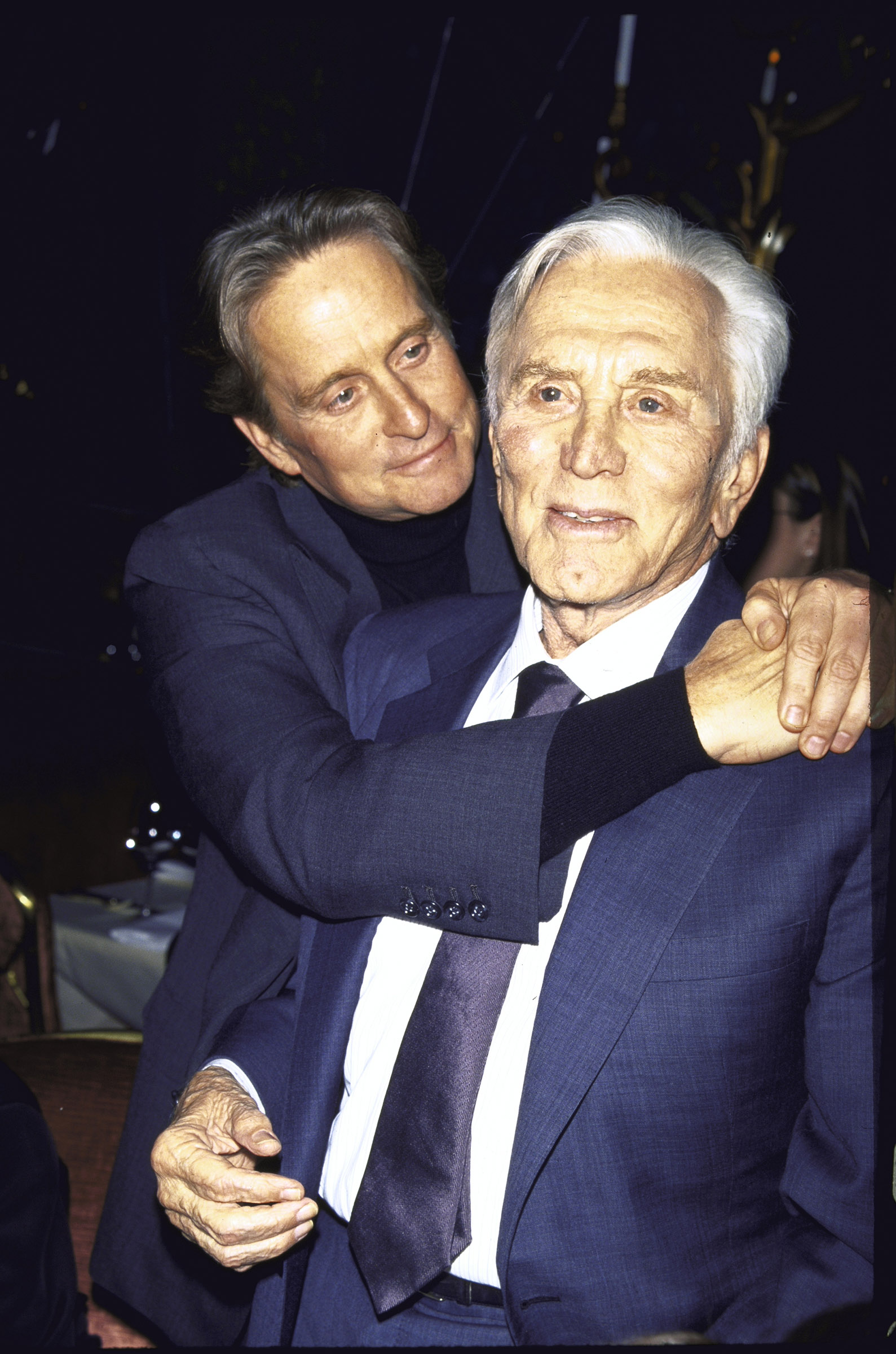 (L-R) Actor Michael Douglas and his father, actor Kirk Douglas, at a film premiere of Kirk's Diamonds in December 1999. (Dave Allocca—The LIFE Picture Collection via Getty Images)