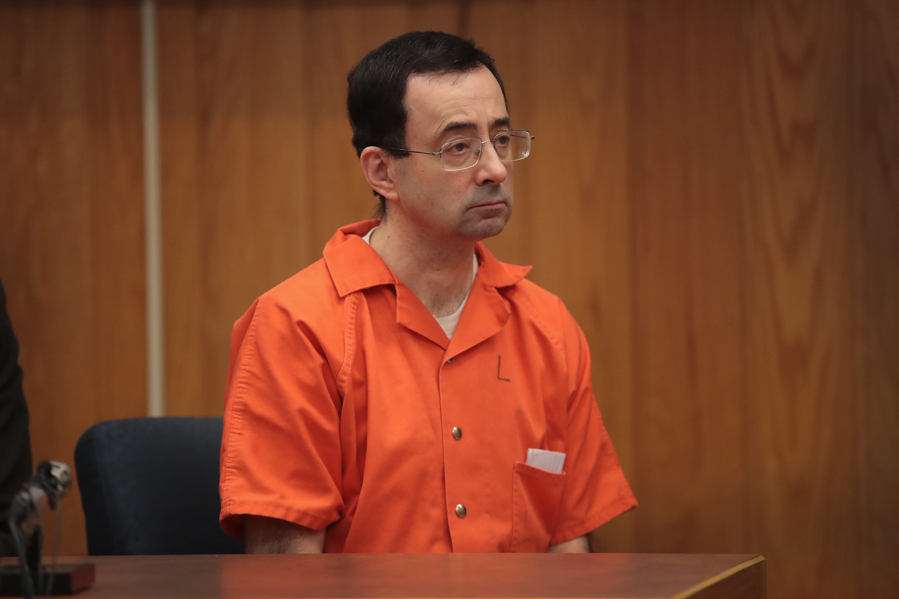 Larry Nassar sits in court listening to statements before being sentenced by Judge Janice Cunningham for three counts of criminal sexual assault in Eaton County Circuit Court on Feb. 5, 2018 in Charlotte, Michigan. (Scott Olson/Getty Images)
