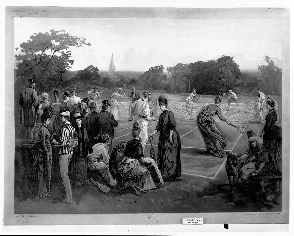 Men in suits and women in long dresses playing lawn tennis. (Library of Congress—Corbis/VCG via Getty Images)