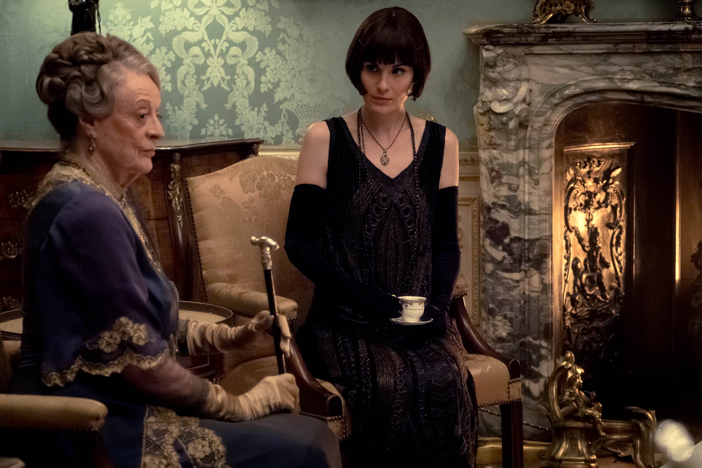 Maggie Smith (left) stars as Violet Crawley and Michelle Dockery as Lady Mary in the 2019 movie <i>Downton Abbey</i>. (Jaap Buitendijk—Focus Features)