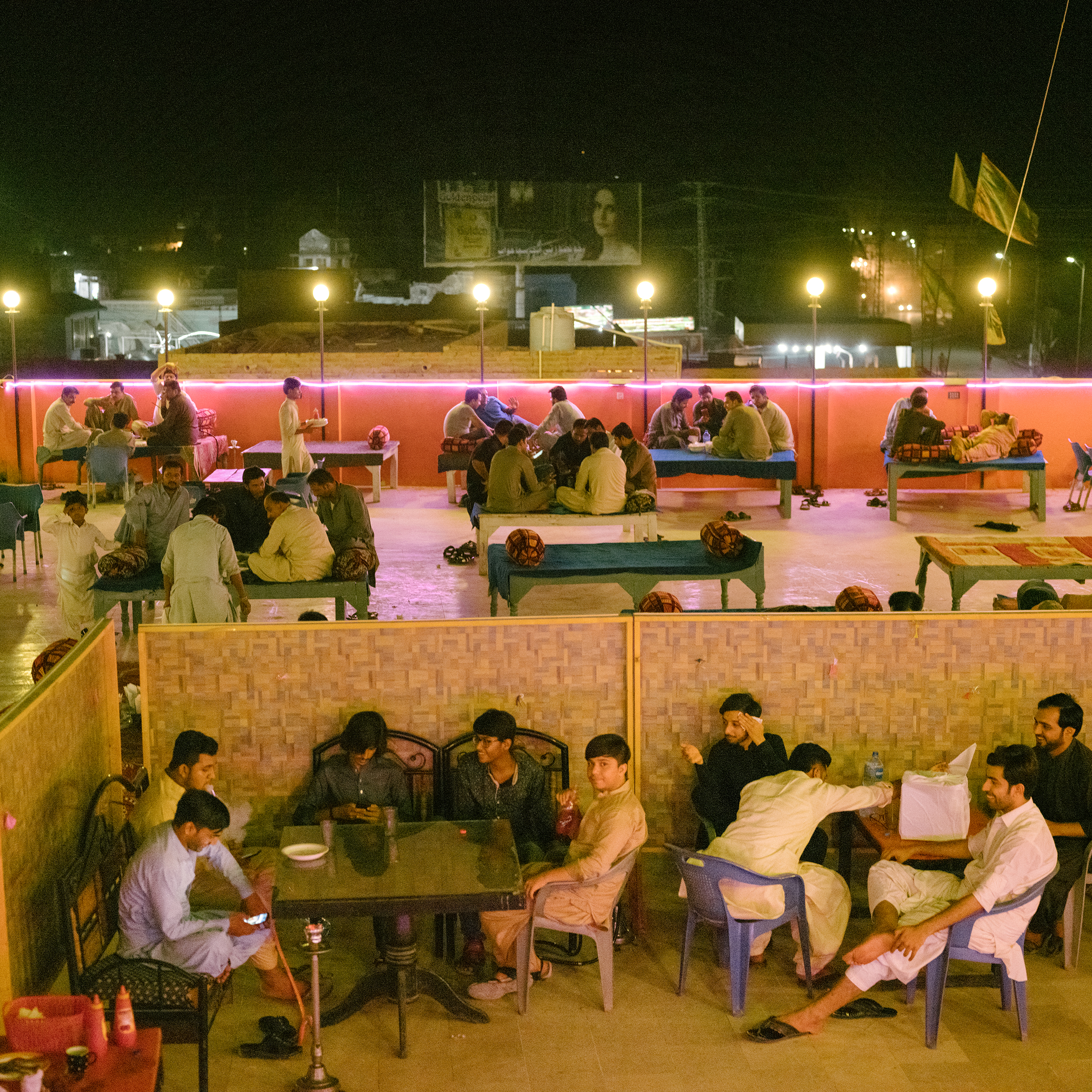 Outdoor restaurants, like this one in Jacobabad on June 27, are only open after sunset. Patrons may stay late into the night. (Matthieu Paley for TIME)