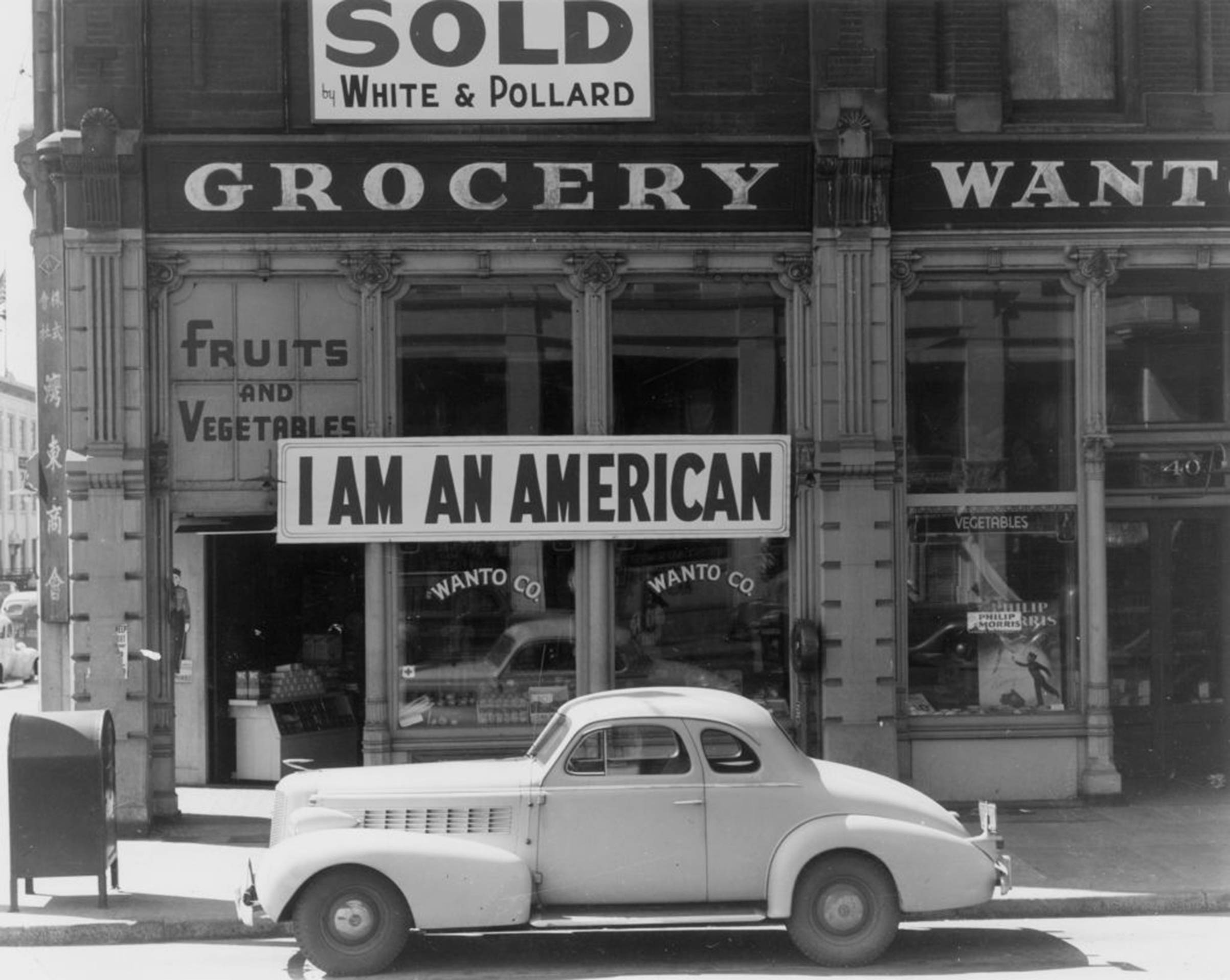 The day after Pearl Harbor, and following evacuation orders for Japanese living in America, the owner of this shop in Oakland, California, who was a University of California graduate of Japanese descent, put this notice across his shop front on Dec. 8, 1941. (Dorothea Lange—Getty Images)