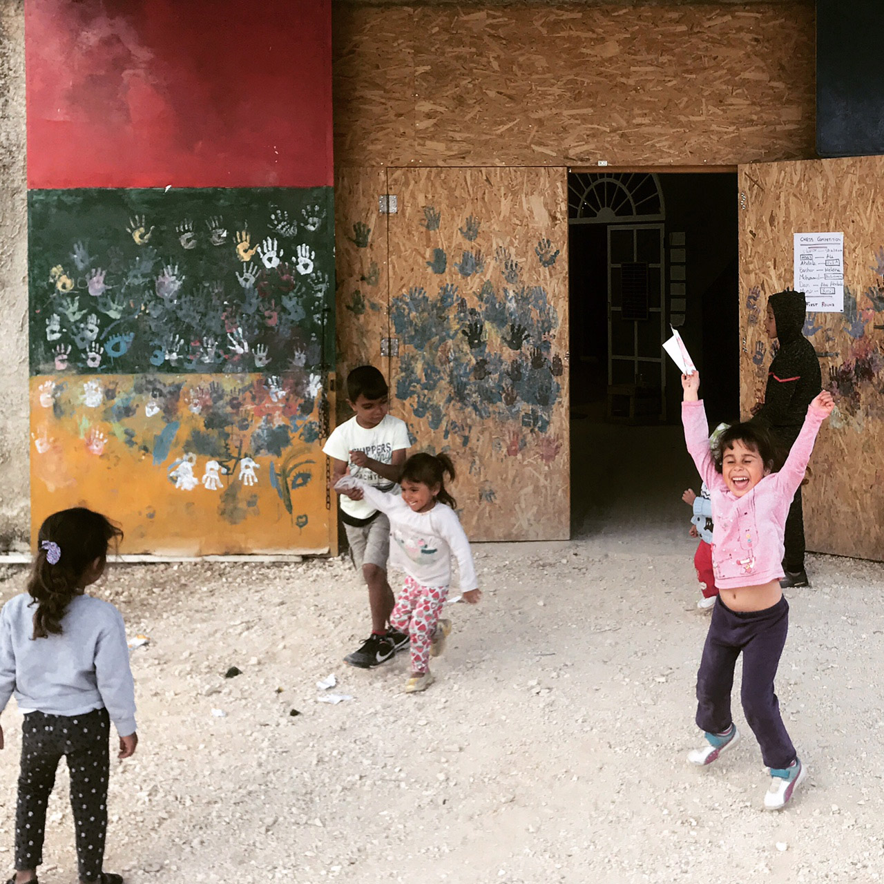 Children playing at Katsikas Camp in Greece in 2018. (Courtesy of Dina Nayeri)