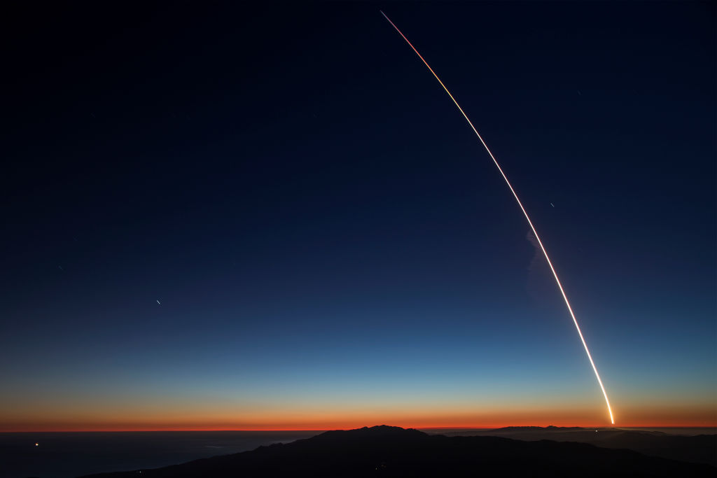 A SpaceX Falcon 9 rocket launches from Vandenberg Air Force Base carrying the SAOCOM 1A and ITASAT 1 satellites, as seen during a long exposure on October 7, 2018 near Santa Barbara, California. (David McNew&mdash;Getty Images)