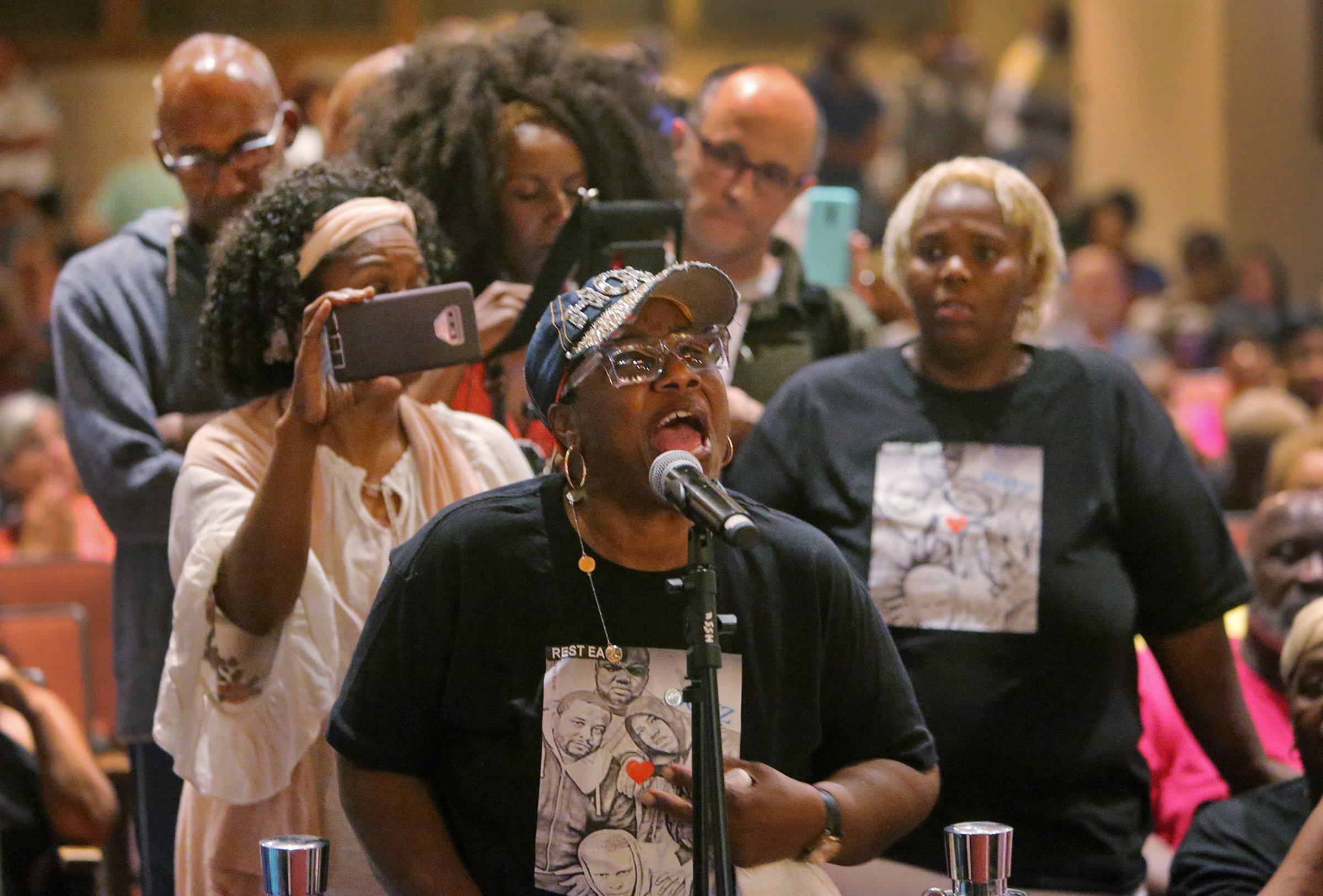 "My heart hurts," said Evelyn Sutton, 68, the first person in line to talk to the panel at the urgent Town Hall Meeting on Gun Violence at Harris-Stowe State University, on Wednesday, Aug. 28, 2019, in St. Louis. Sutton said she lost four relatives - two grandchildren and two nephews to gun violence. She said she hurts for all of the victims of gun violence. (J.B. Forbes—AP)