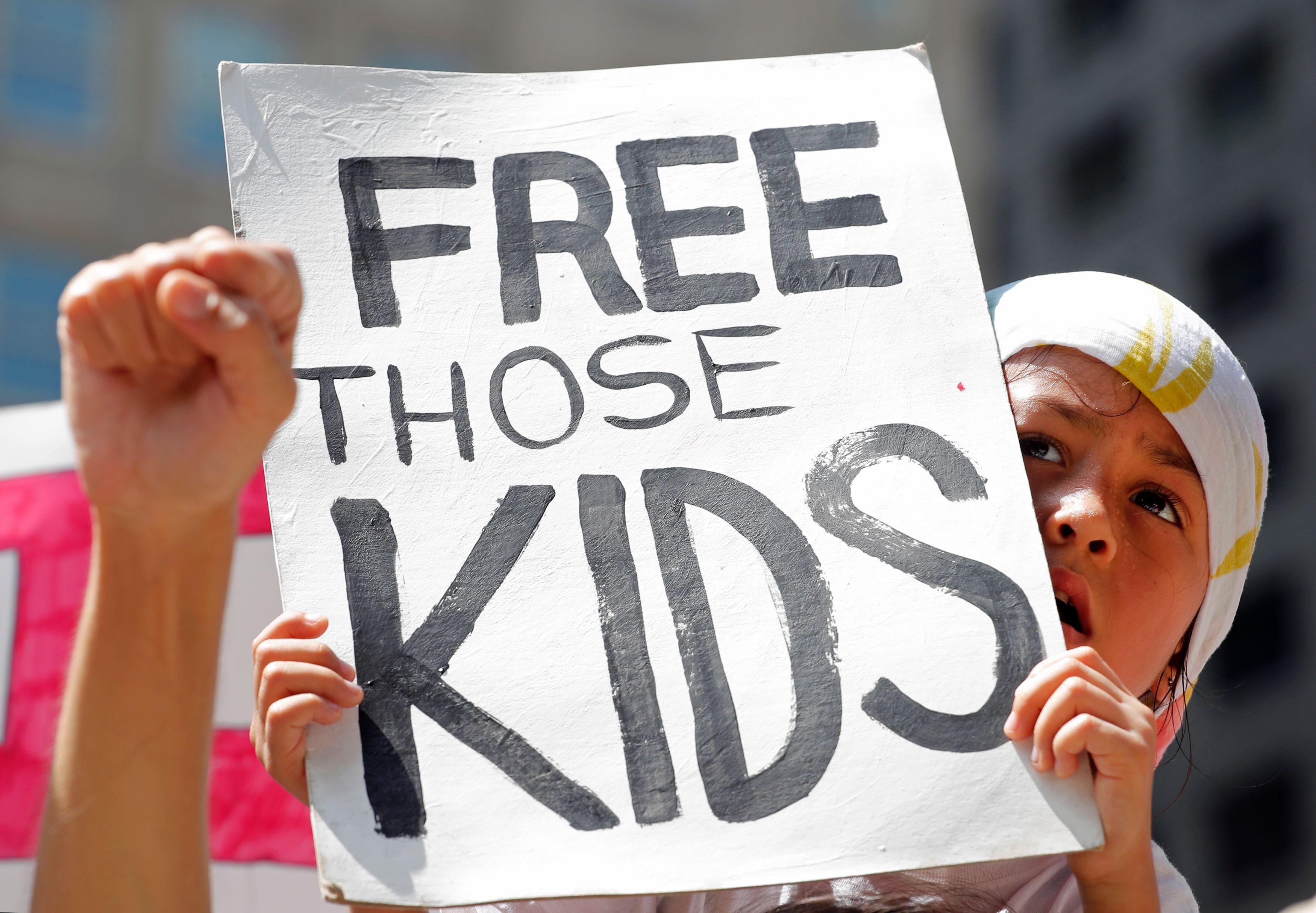 A girl takes part in a protest against the US immigration policies separating migrant families in Chicago, June 30, 2018. - (Jim Young—AFP/Getty Images)