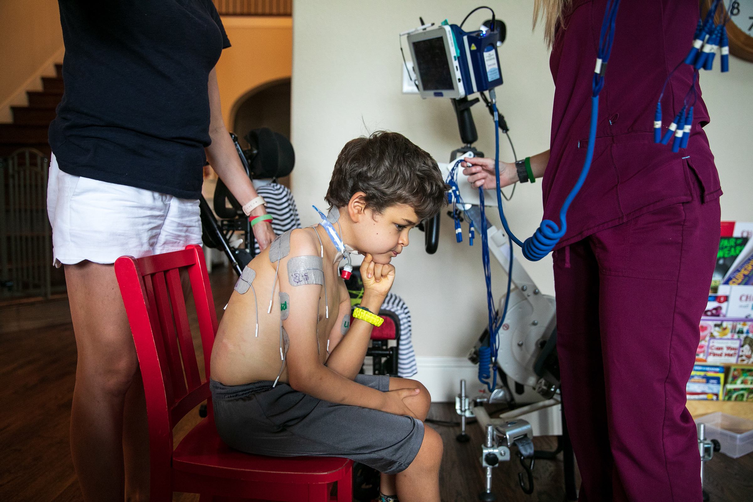 Braden's nurse and mother set him up for treatment. (Ilana Panich-Linsman for TIME)