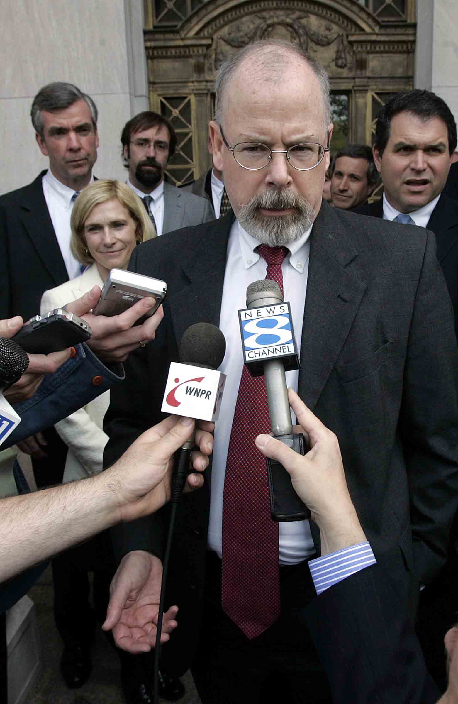 John Durham speaks to reporters outside of the U.S. District Court in New Haven, Conn. on April 25, 2006. (Bob Child—AP)