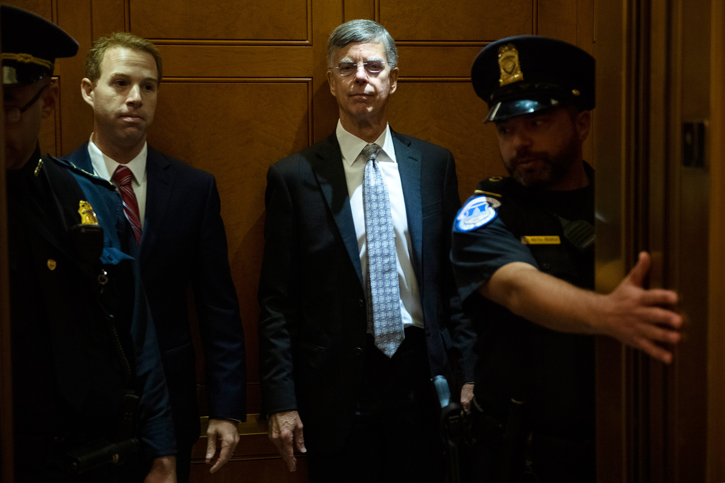 Bill Taylor, center, the acting U.S. ambassador to Ukraine, arrives at the Capitol for a deposition related to the House's impeachment inquiry on Oct. 22, 2019. (Tom Williams—CQ-Roll Call/Getty Images)