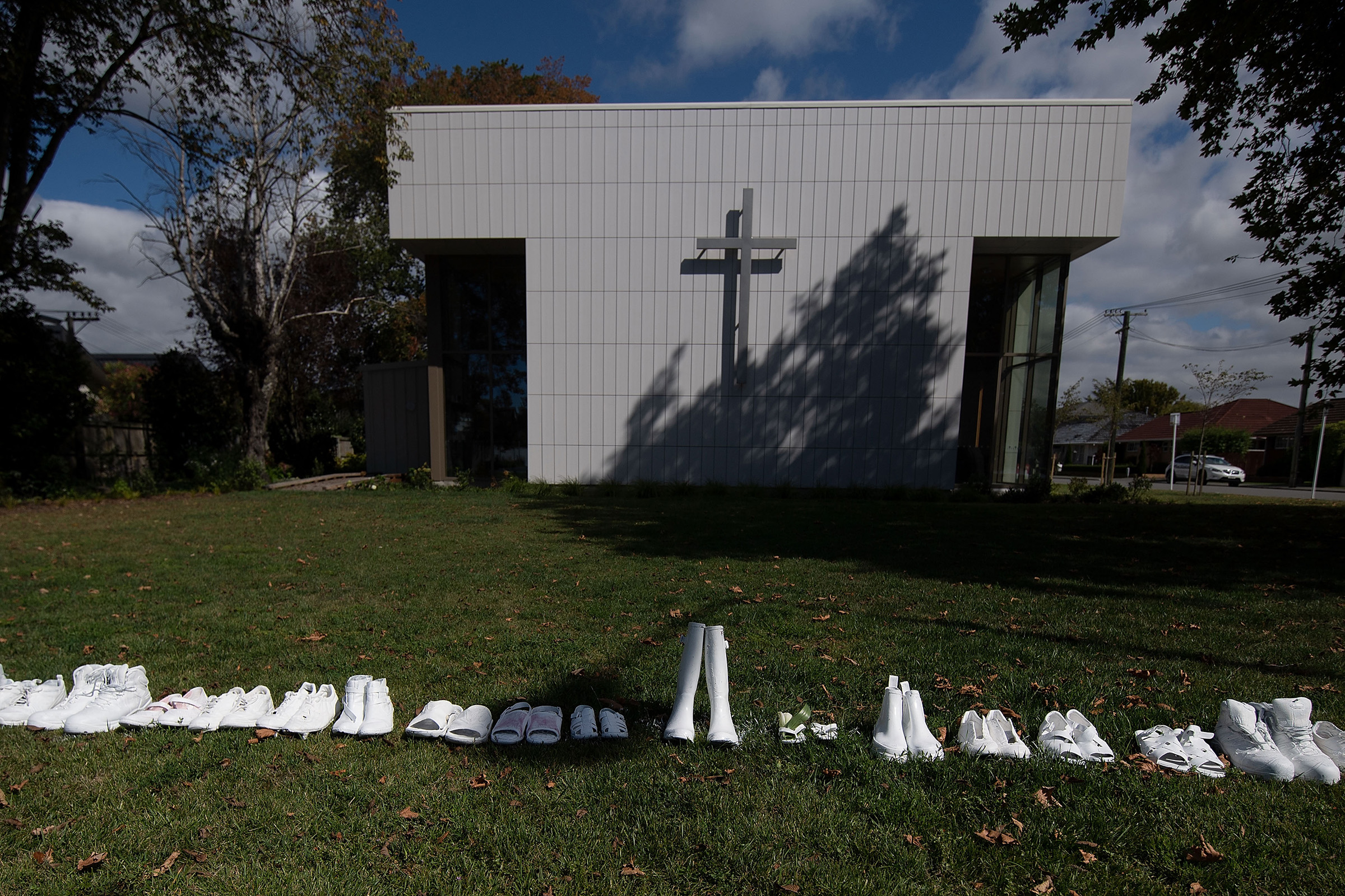 Fifty pairs of shoes lay outside the All Souls Church representing the 50 people gunned down at the two mosques in Christchurch on March 19, 2019. (Marty Melville—AFP/Getty Images.)