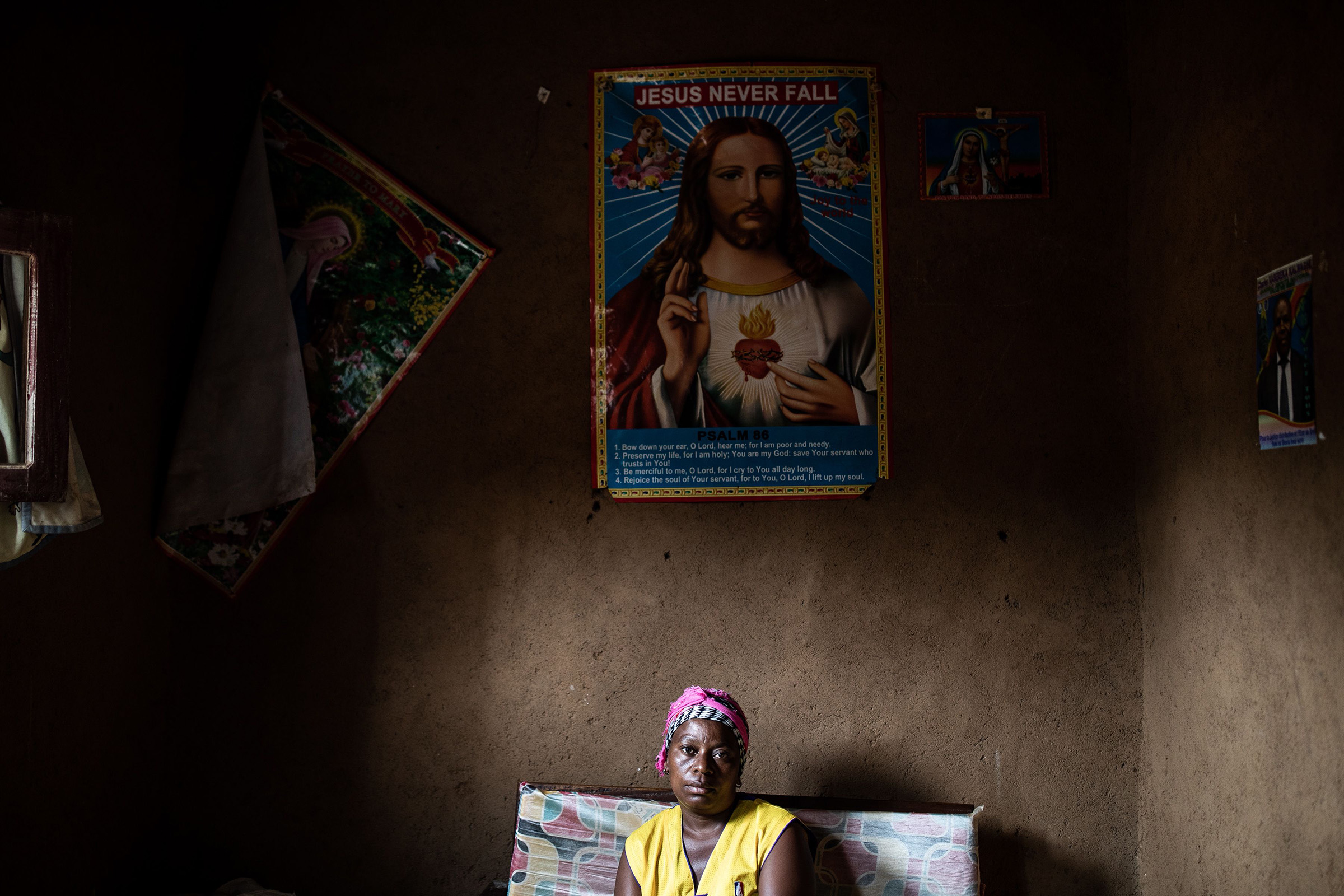 Janine Kibwana, 32-years-old, an Ebola survivor and mother to five children sits inside her living room in Beni, north eastern Democratic Republic of the Congo on September 17, 2019. (John Wessels—AFP/Getty Images)