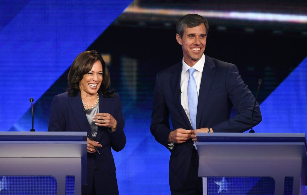Democratic presidential hopefuls California Senator Kamala Harris and Former Texas Representative Beto O'Rourke share a laugh during a break in the third Democratic primary debate of the 2020 presidential campaign season hosted by ABC News in partnership with Univision at Texas Southern University in Houston, Texas on September 12, 2019. (ROBYN BECK—AFP/Getty Images)