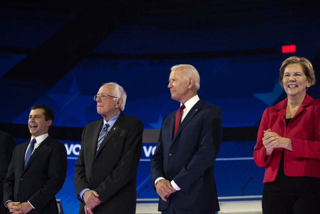 2020 presidential candidates Pete Buttigieg, mayor of South Bend, Ind., Senator Bernie Sanders of Vermont, former Vice President Joe Biden, and Senator Elizabeth Warren of Massachusetts stand on stage during the Democratic presidential candidate debate in Houston, Texas, U.S., on Thursday, Sept. 12, 2019. (Bloomberg—Bloomberg via Getty Images)