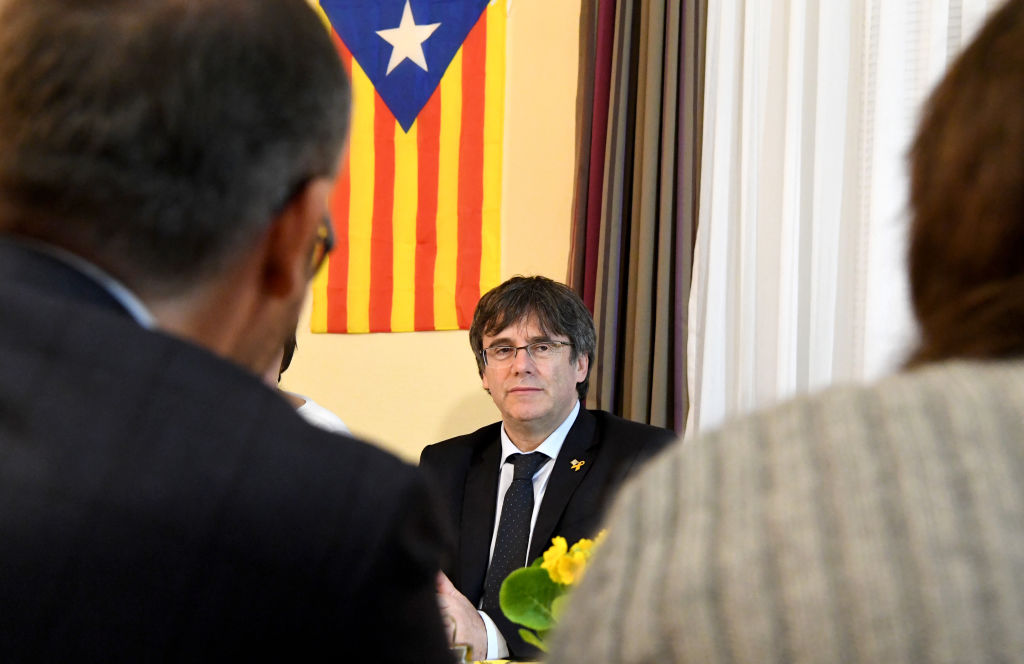 Catalan separatist leader Carles Puigdemont talks to supporters. (Carsten Rehder – Picture Alliance/Getty Images)