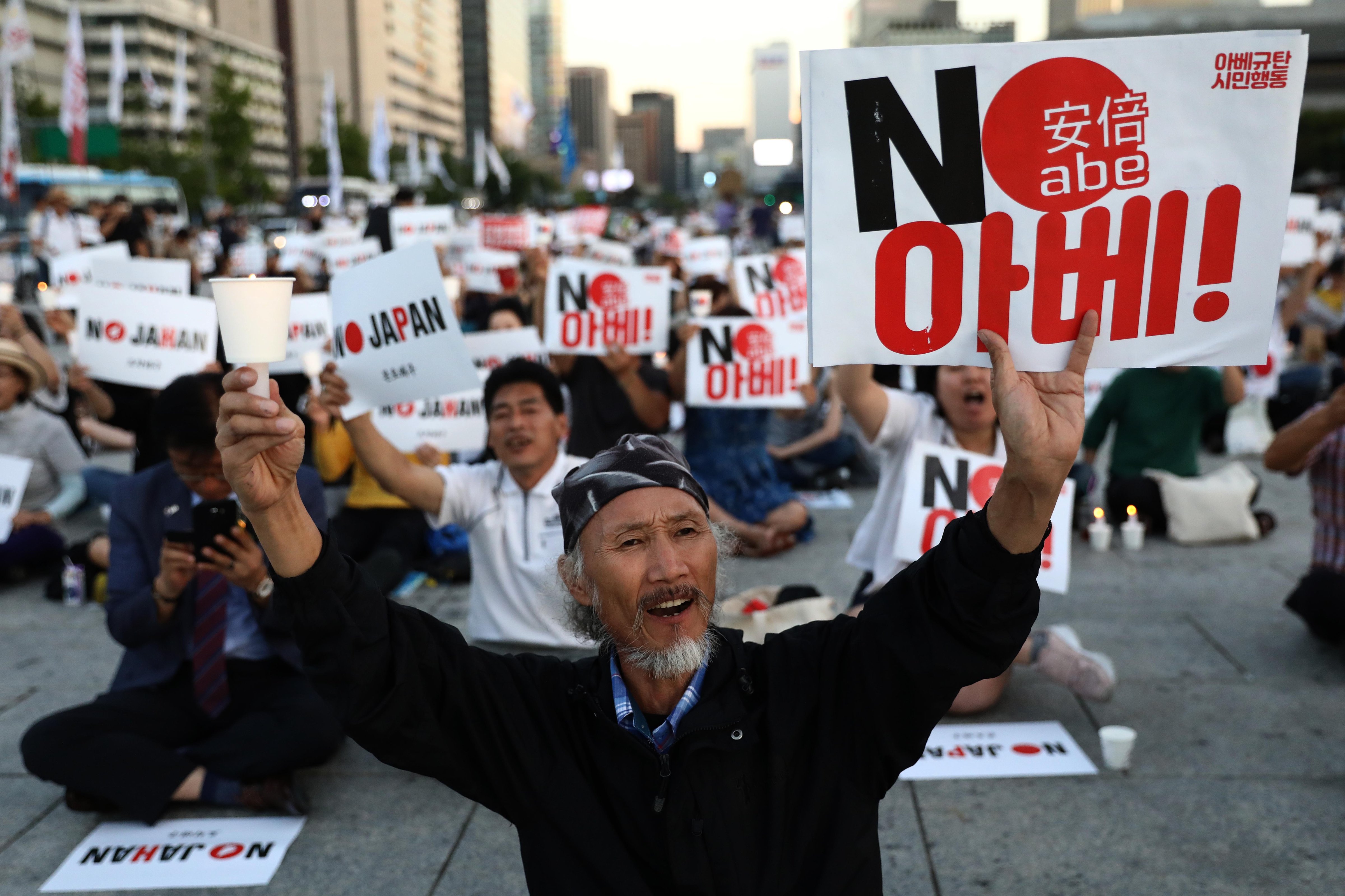 South Koreans participate in a rally to denounce Japan's new trade restrictions and Japanese Prime Minister Shinzo Abe on August 24, 2019 in Seoul, South Korea. The bilateral relationship between Japan and South Korea has worsened recently, with the Japanese government's decision to remove South Korea from so-called 'white list' of trade restriction. Some Korean protesters, students and conservative shop owners have started boycotting Japanese products. (Chung Sung Jun – Getty Images)