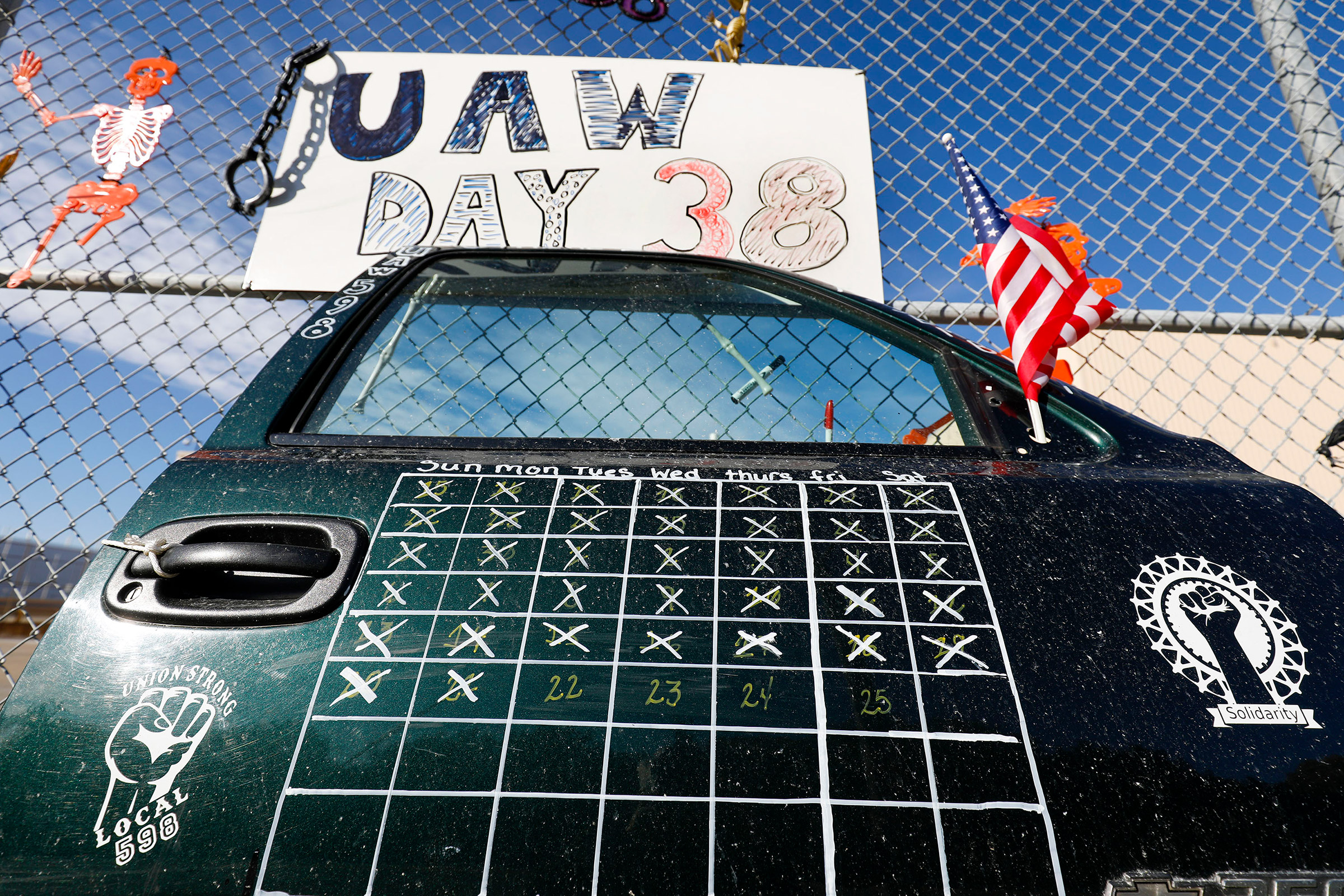 A truck door with a calendar on it that shows the number of days that the UAW-GM strike has lasted is shown at the General Motors Flint Assembly plant in Flint, Mich. on Oct. 23. (Bill Pugliano—Getty Images)
