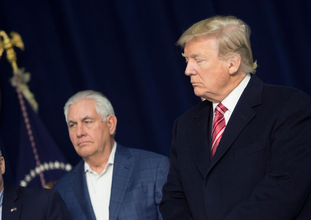U.S. Secretary of State Rex Tillerson and U.S. President Donald Trump listen as Republicans take turns speaking to the media at Camp David on January 6, 2018 in Thurmont, Maryland. (Pool&mdash;Getty Images)