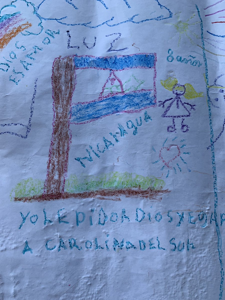 An 8-year-old girl writes "Yo le pido a Dios que llegamos a Carolina del Sur," or "I ask God that we can get to South Carolina." She is living in a tent encampment in Matamoros, across the border from Brownsville, Texas. (Courtesy of Belinda Arriaga)
