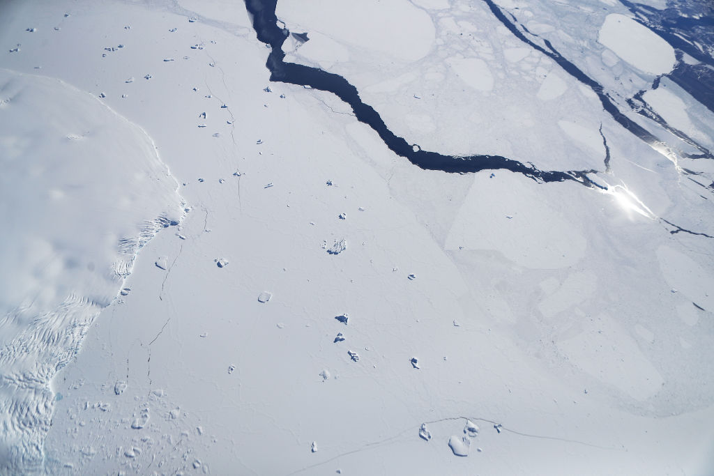 Sea ice and icebergs float as seen from NASA's Operation IceBridge research aircraft off the coast of the Antarctic Peninsula region, on November 3, 2017, above Antarctica. (Mario Tama—Getty Images)