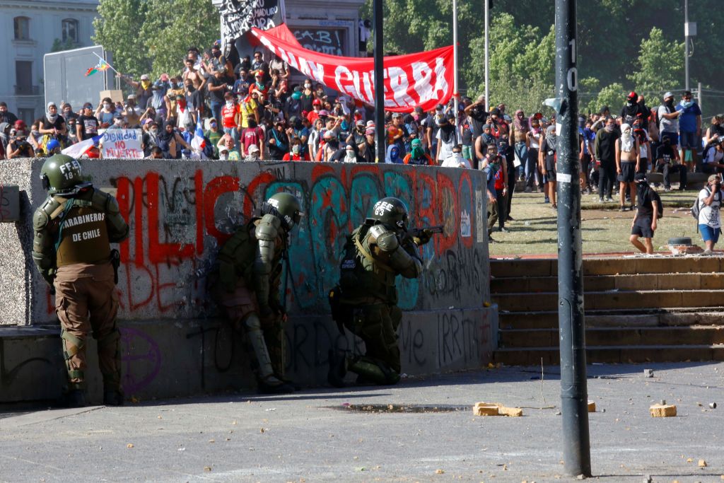 SANTIAGO, CHILE - OCTOBER 24: Security forces intervene in protests in Santiago, Chile on Oct. 24, 2019. (Sebastian Brogca—Anadolu Agency)