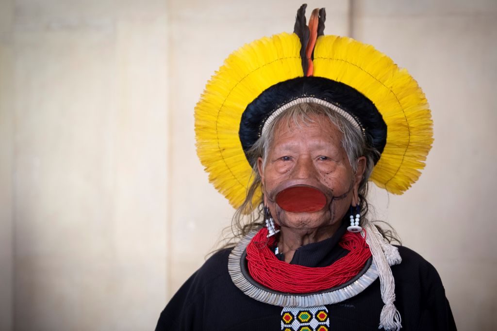 Brazil's indigenous chief Raoni Metuktire looks on as he is welcomed by French Minister for the Ecological and Inclusive Transition in Paris on May 13, 2019. (Eric Feferberg—AFP)